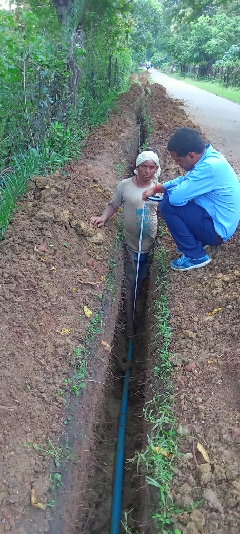 Open trench with duct under inspection