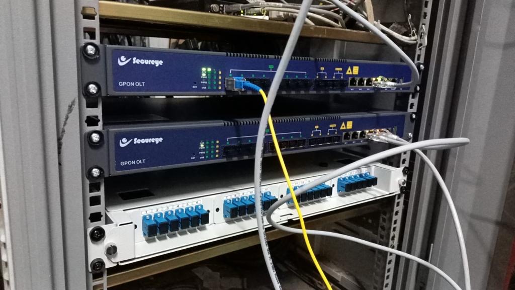 GPON OLTs and fiber patch panel in rack