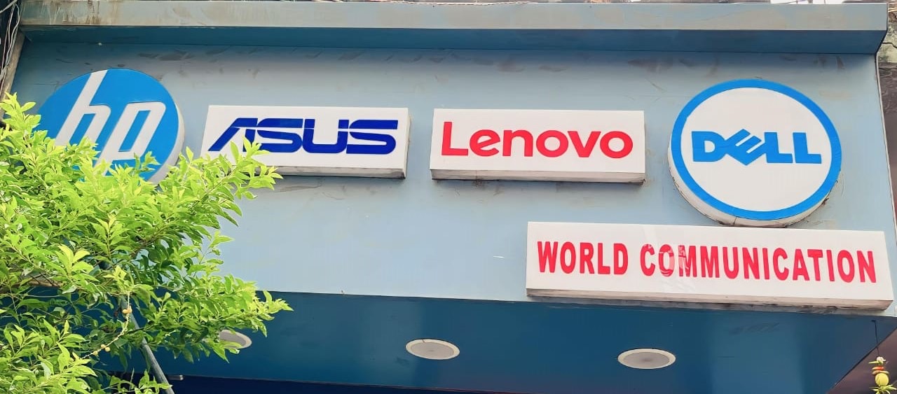 World Communication storefront with technology brand signage