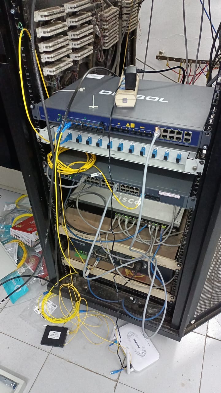Railway telecom room rack with OLT, fiber panel and Cisco switch